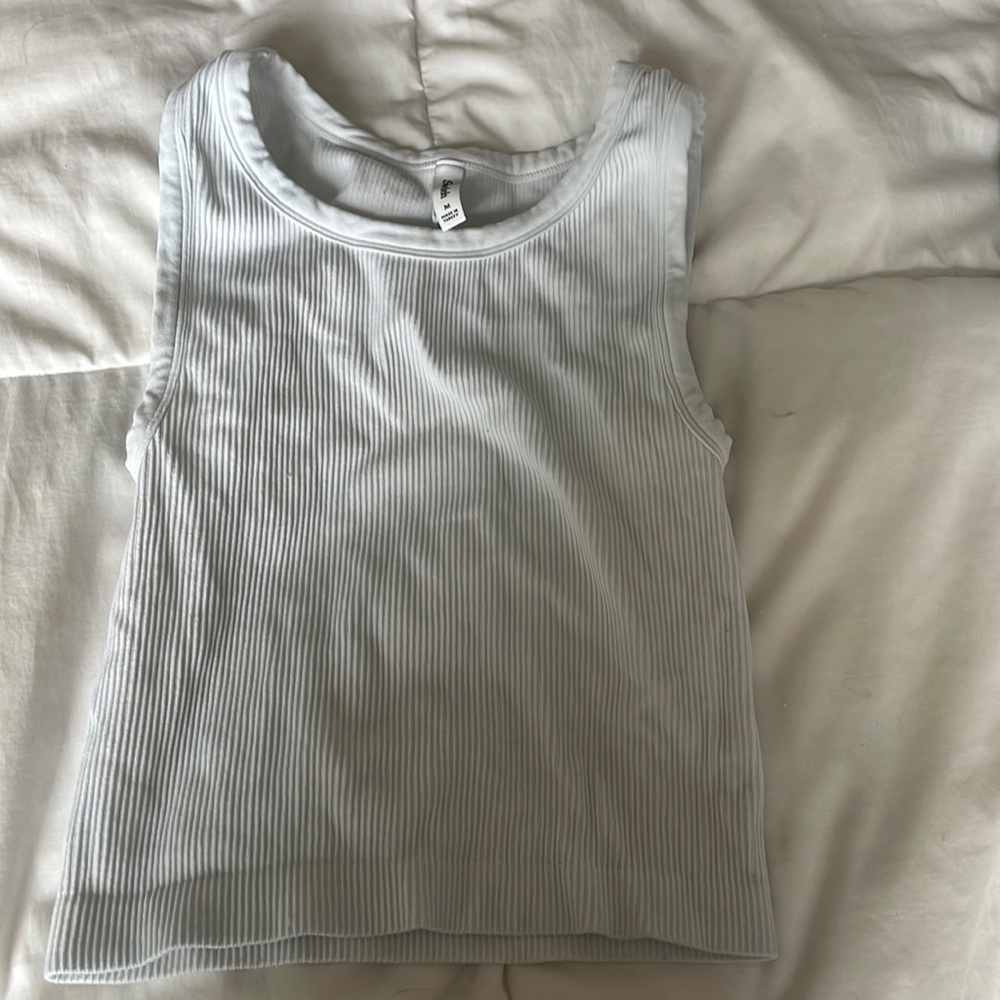 Aritzia tank top brand is sun-deh medium